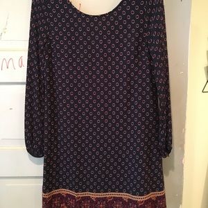 Patterned navy blue shift dress with long sleeves